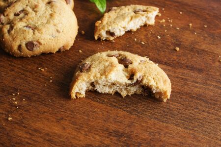 cookies with chocolate on a wooden backgroundの写真素材