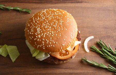 burger on a wooden backgroundの写真素材