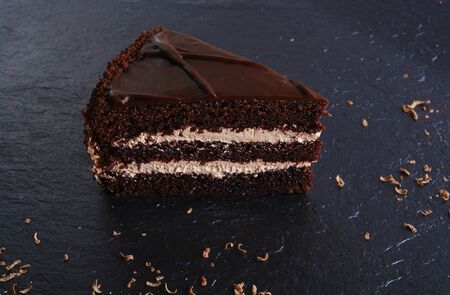 cake prague chocolate dessert on stone background blackの写真素材