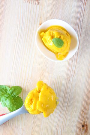 mango sorbet on a light backgroundの写真素材
