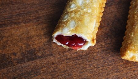 cherry pie Oil fried wild berries jam on a wooden backgroundの写真素材