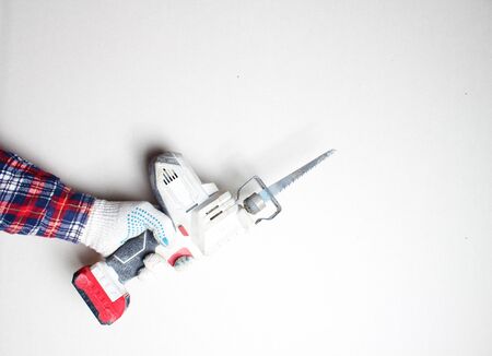 reciprocating saw gloved hand builder batteryの写真素材