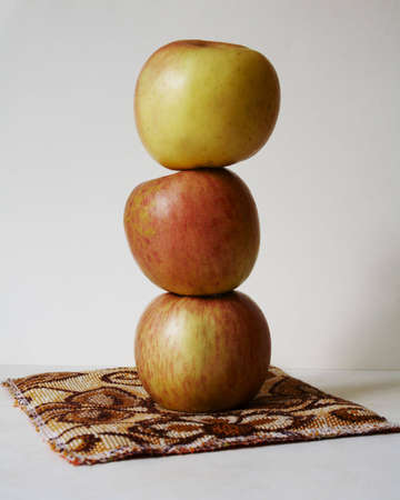 piramid build of three apples の写真素材