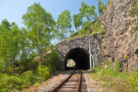 photo of old railroad tunnel on obsolete railroad near Lake Baikalの写真素材