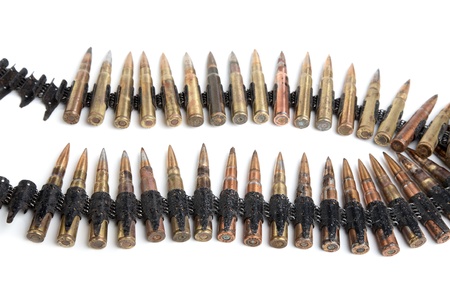 Machine-gun tape with cartridges of times  Second World War on a white backgroundの写真素材