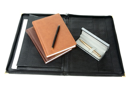 folder and organizers with  pen  on a white backgroundの写真素材