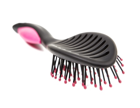 Black female hairbrush isolated on a white backgroundの写真素材