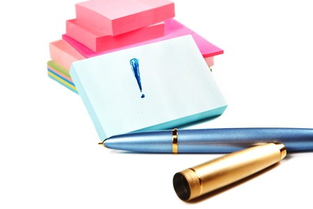 Pile of stickers with  pen isolated on a white backgroundの写真素材