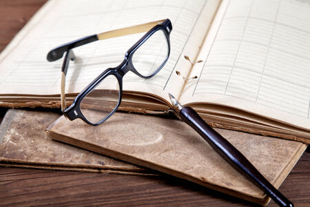 Still-life with old writing-books a nib の写真素材