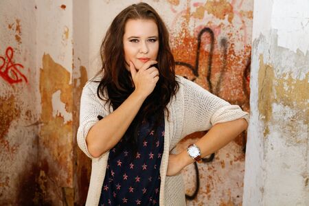 Beautiful plus size woman expresses delightの写真素材