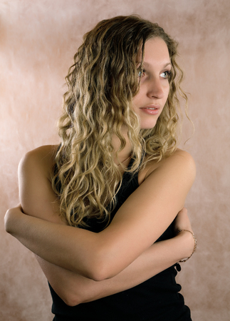 Portrait of the beautiful girl in warm colours. studio shootingの写真素材