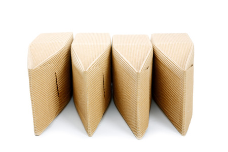 boxes from the goffered cardboard isolated on a white backgroundの写真素材