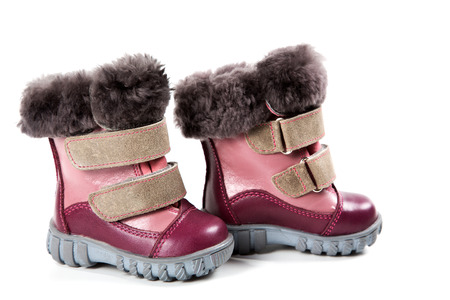 Children's winter boots isolated on white background
