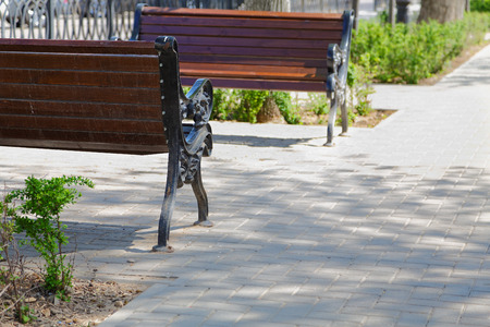 outdoor benches in the city in spring dayの写真素材
