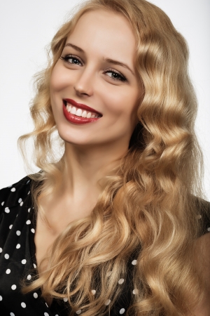 beautiful blonde girl portrait on white background close-upの写真素材