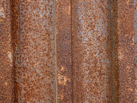 The texture is rusty, old, metal fence. Backgroundの写真素材