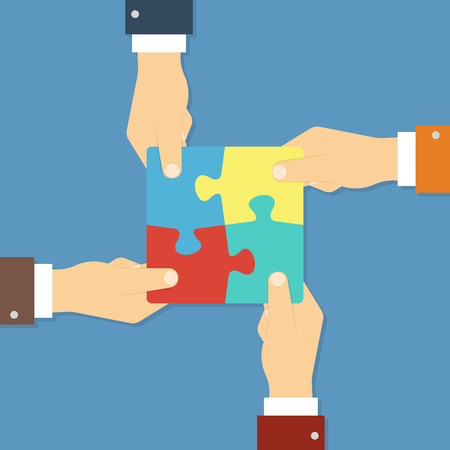 Teamwork and cooperation concept. Hands holding puzzle pieces together. Vector illustration in flat styleのイラスト素材