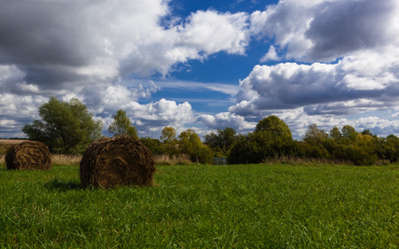 Haystacks on the bank of the river. Ruza. Autumn, September, noon.の写真素材
