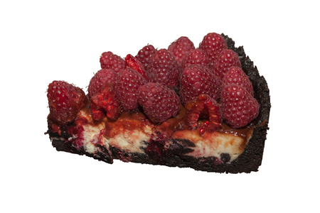 The piece of the raspberry cheesecake on a white background.の写真素材