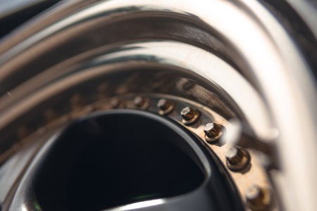 an alloy wheel, a wheel of an old racing car. Close up of vehicle details. Drivers style concept. Racing parts. Selective focusの写真素材