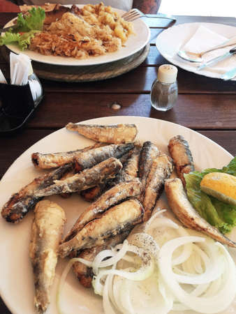 Dish of delicious stuffed and fried sardines, Mediterranean food.