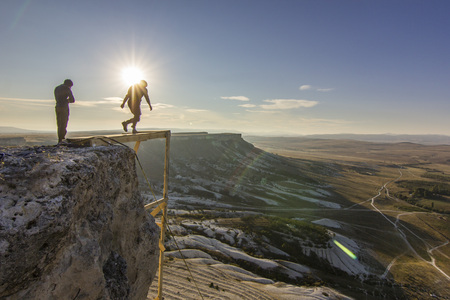 base-jumper jumps from the cliffの写真素材