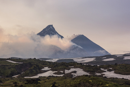 active volcanoes of Kamchatka at sunset