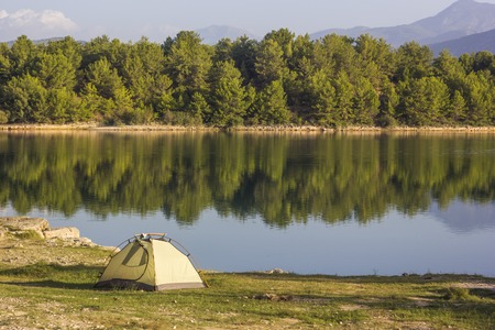 tent near lake at sunrise in turkeyの写真素材