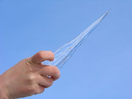 Icicle in the handの写真素材