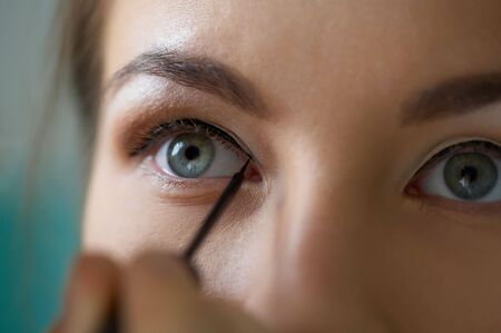 Close-up shot of work of make-up specialist. Low-focus image.の写真素材