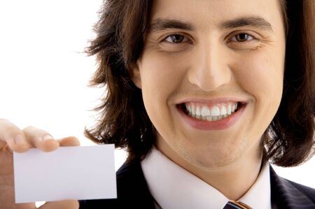 Businessman with card in hand on whiteの写真素材