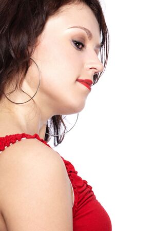 portrait of beautiful slavonic model girl posing in red topの写真素材