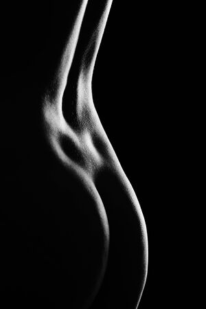 female back on black backgroundの写真素材