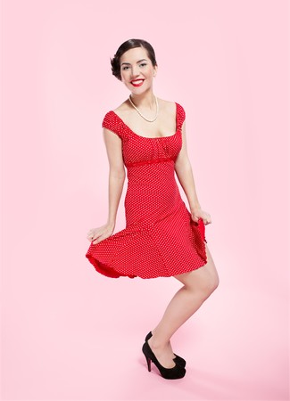 pin-up style portrait of beautiful brunette girlの写真素材