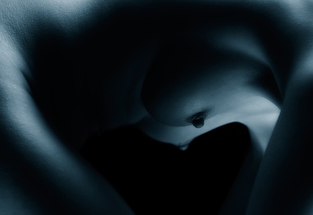 body part portrait of young naked blonde woman with beautiful body and perfect breastsの写真素材