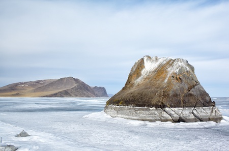 outdoor view of rocks in frozen baikal lake in winterの写真素材