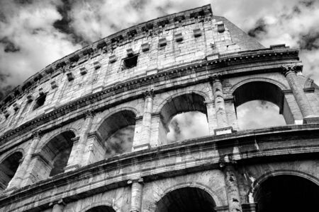 Monochrome photo of Colosseum the most well-known and remarkable landmark of Rome and Italyの写真素材