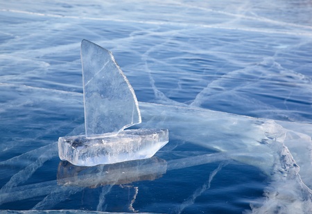 Yacht made of ice blocks on winter lake Baikal の写真素材