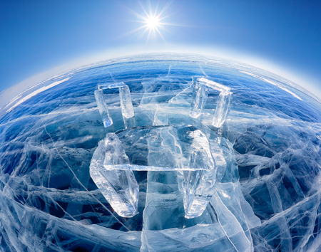 Wide-angle shot of  Icehange - stonehenge made from ice on lake Baikal in Sineria under winter Sunの写真素材