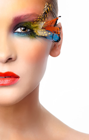 Woman with bright stylish make-up and false fashion feather eyelashes の写真素材