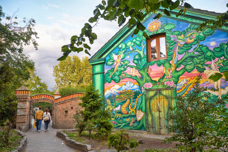 COPENHAGEN, DENMARK - AUGUST 22, 2014: The house painted by author graffiti at the entrance to Christiania in Copengagen, Denmark. Christiania,  also known as Freetown Christiania (Danish: Fristaden Christiania) is a self-proclaimed autonomous neighbourhoのeditorial素材