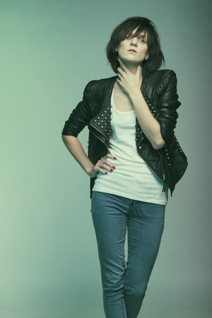 Androgyny female model in Heroin chic style. Old style tinted imageの写真素材