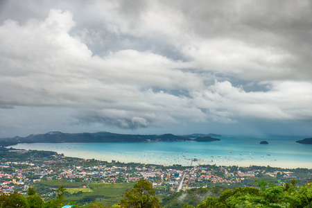 Bird's-eye view on bay of Andaman sea from the highest point on Phuket island in Thailandの写真素材
