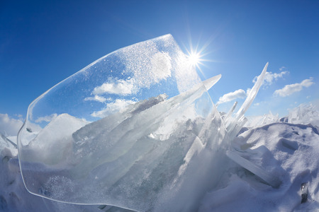 Ice floe and sun over winter Baikal lakeの写真素材
