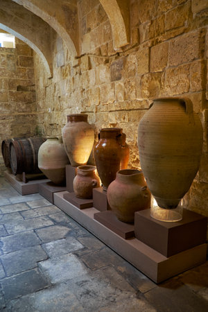 BIRGU, MALTA - JULY 25, 2015: The ceramic vases and barrels in the kitchen area of the Inquisitor's palace in Vittoriosa (Birgu), Malta.のeditorial素材