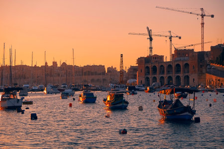 The view of Kalkara bay between Birgu and Kalkara peninsular in the sunset light, Malta.のeditorial素材