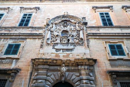 Facade of Maltese Ministry for Tourism office, the former Auberge dÃ¢ï¿½ï¿½Italie, the residence of the Italian Knights, Valletta, Maltaのeditorial素材