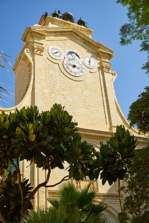 The view of PintoÃ¢ï¿½ï¿½s turret clock which show the hour, the day, the month and the phases of the moon in Prince Alfred's Courtyard of Grandmaster's Palace. Valletta. Maltaのeditorial素材
