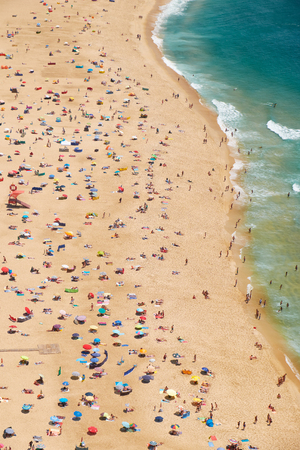 Bird's-eye view on Nazare sandy beach riviera on the coast of Atlantic ocean. Portugalの写真素材