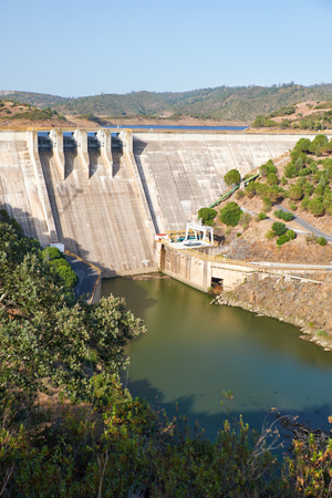 Pomarao Dam and hydroelectric power station on Chanza Reservoir near river Guadiana on the boundary between Portugal and Spainの写真素材